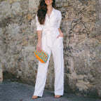 Stocking and delivery of additional Lapel Plain Belted White Jumpsui