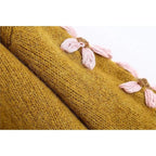 pink embroidered sweater