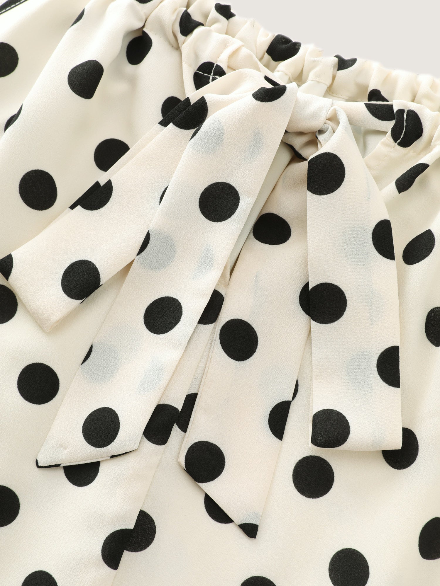 Polka Dot Charm Flowy Tank Top