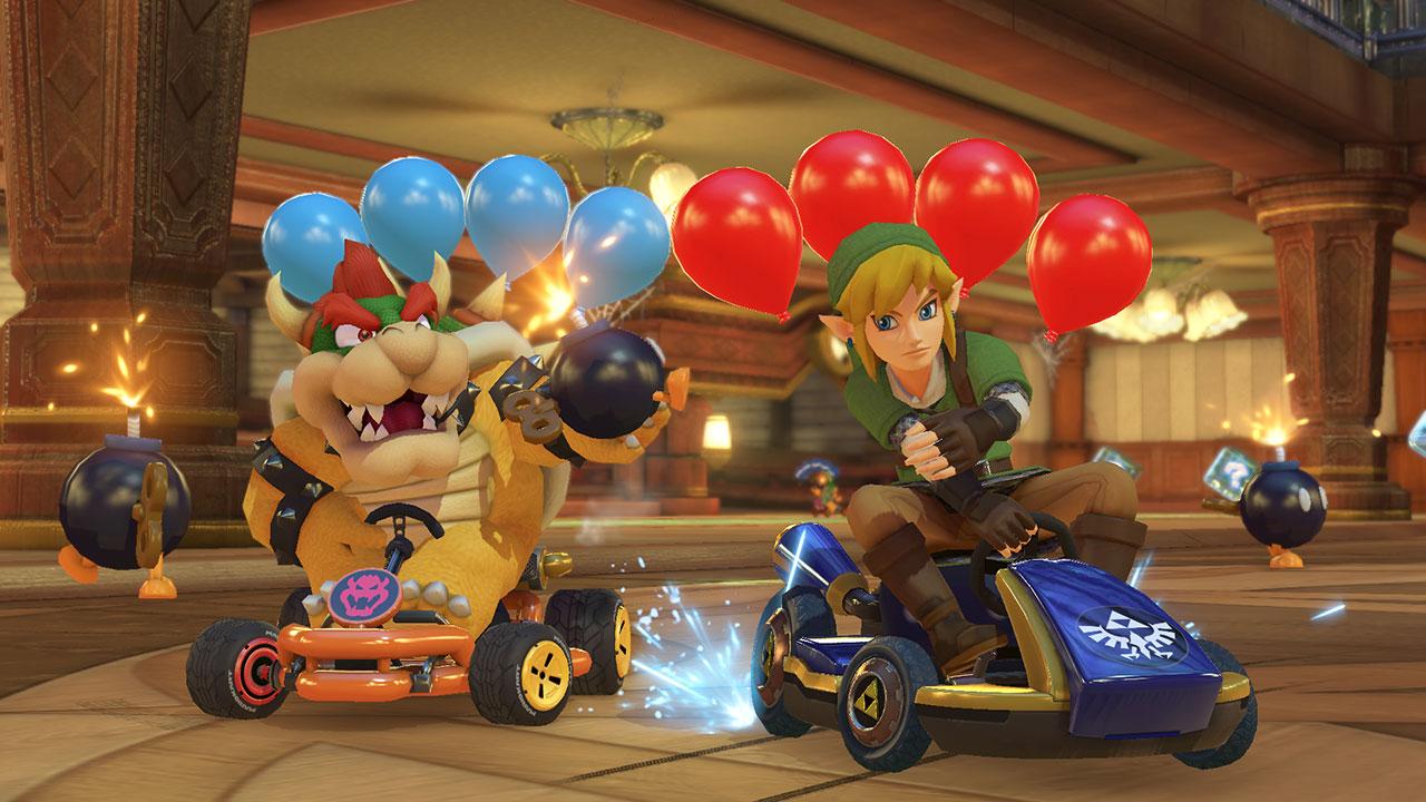 Nintendo SwitchTM w/ Neon Blue &amp; Neon Red Joy-ConTM + Mario KartTM 8 Deluxe (Full Game Download) + 3 Month Nintendo Switch Online Individual Membership