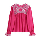 pink pleated blouse
