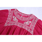 pink pleated blouse