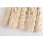 beige criss-cross sweater