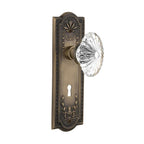 Meadows Plate with Keyhole 2-3/8 in. Backset Antique Brass Privacy Bed/Bath Oval Fluted Crystal Glass Door Knob