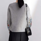 loose embroidered sweater